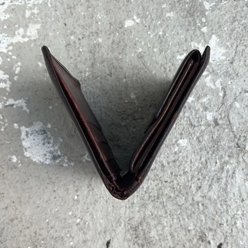 Vintage Louis Vuitton Taiga leather wallet